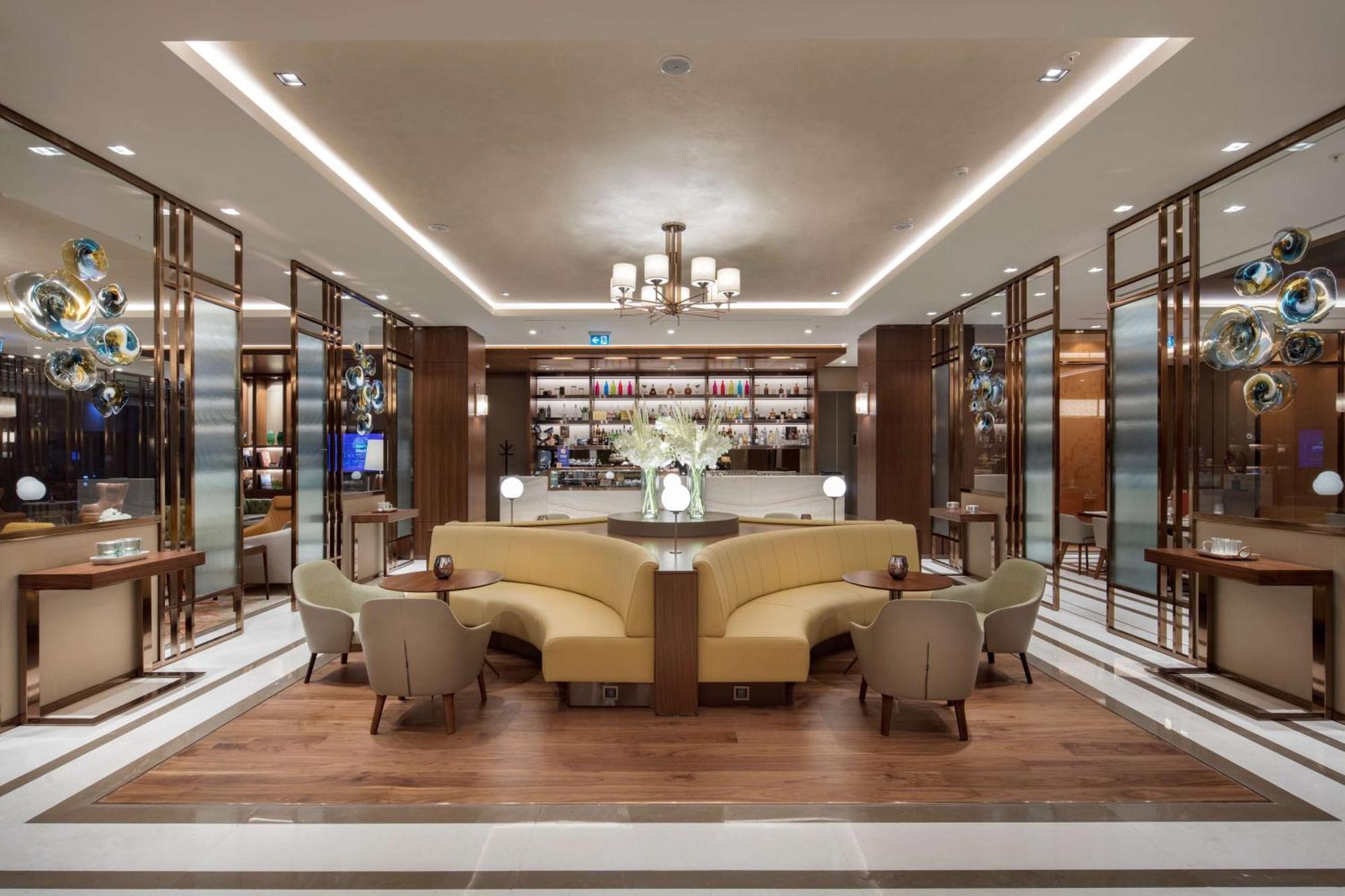 Hotel Doubletree By Hilton Skopie Exterior foto The lounge at Changi Airport